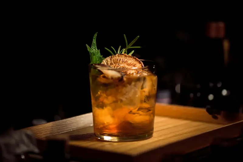 Professional bartender preparing cocktails in a luxury hotel bar