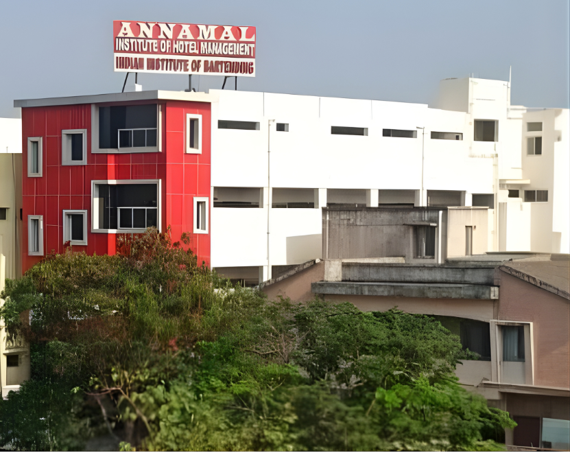 Hotel management students practicing fine dining service at Annamal Institute